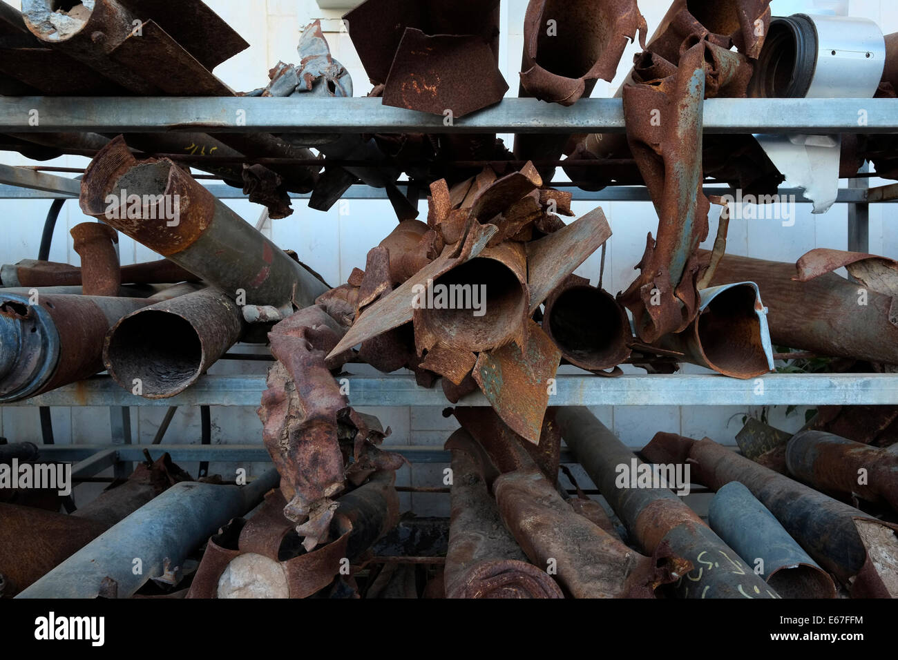 Remnants of several types of exploded Qassam rockets that were fired by ...