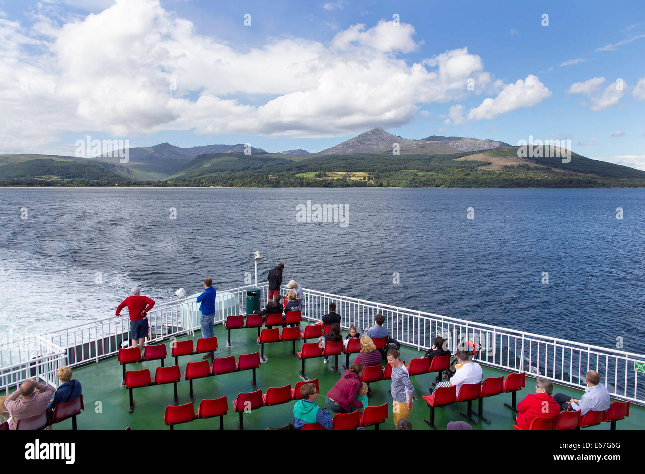 On the Caledonian MacBrayne ferry from the Isle of Arran - mountains of Goat Fell left behind Stock Photo