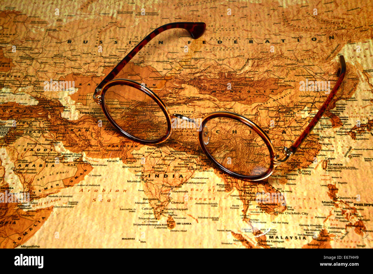 Glasses on a map of a world - China Stock Photo