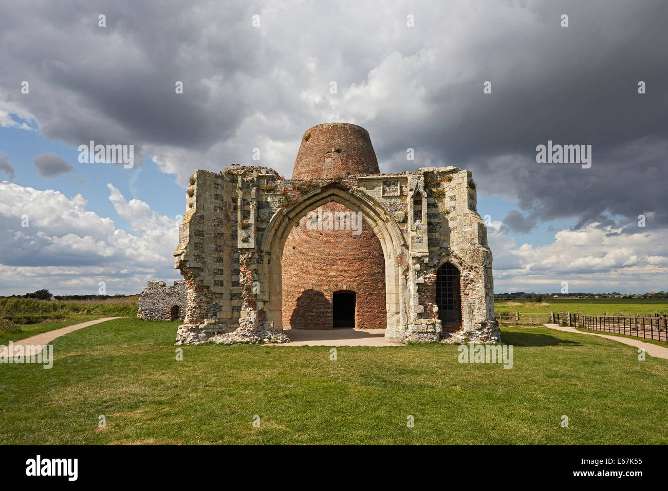 Saint Benet's abbey gate house near Ludham on the Norfolk Broads with the remains of a windmill built into the abbey walls Stock Photo