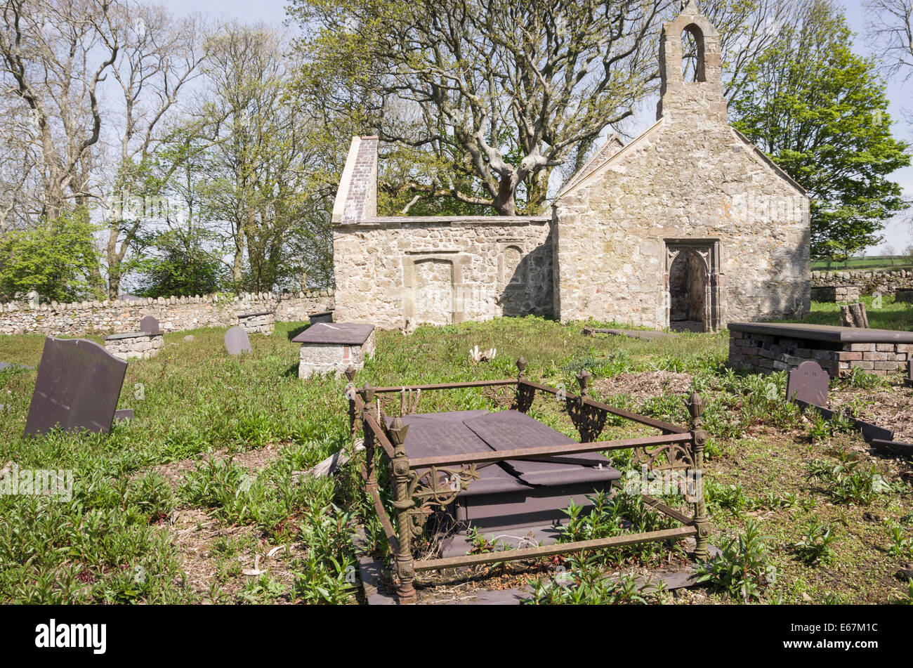 Remains of a disused and abandoned country parish church near Pentre Berw, Isle of Anglesey, North Wales, UK, Britain Stock Photo