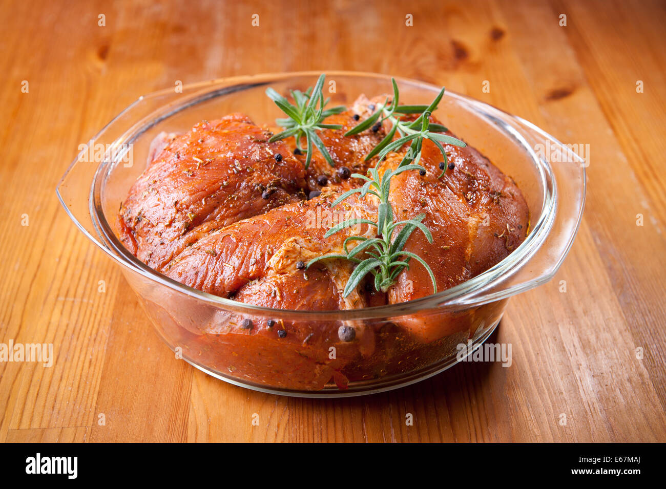 Raw pork meat flavored with rosemary Stock Photo Alamy