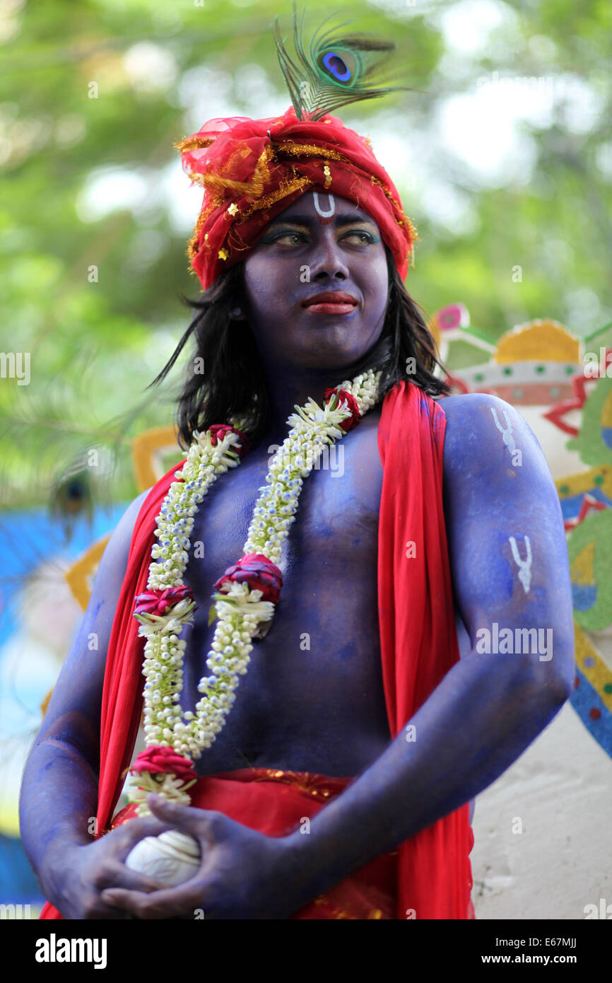 A Bangladeshi Hindu boy dressed like Lord Sri Krishna take part in ...