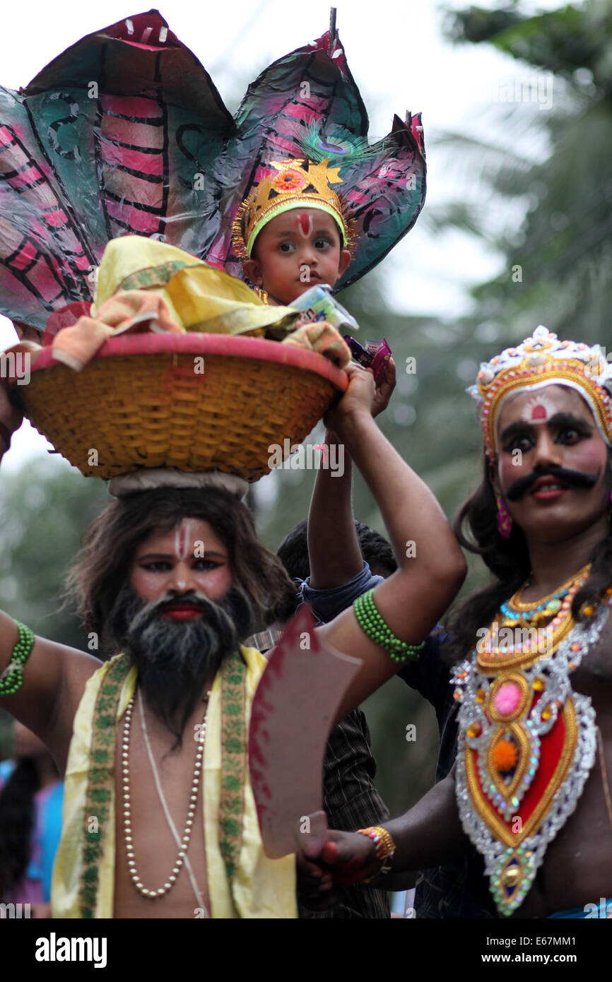 Thousands of Hindu devotees attend a procession during the celebration ...