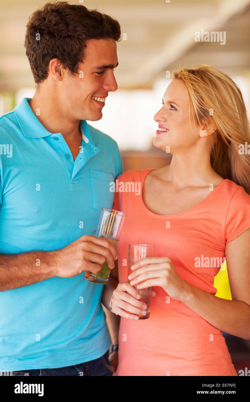 beautiful young couple hanging out at the bar having drinks Stock Photo Alamy