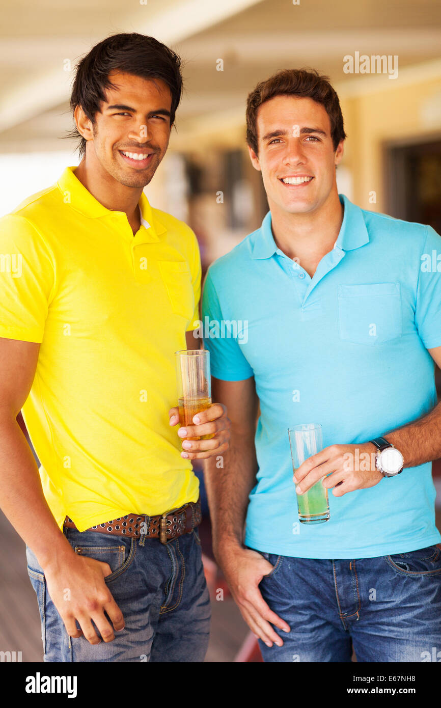 two young adult friends hanging out at pub Stock Photo
