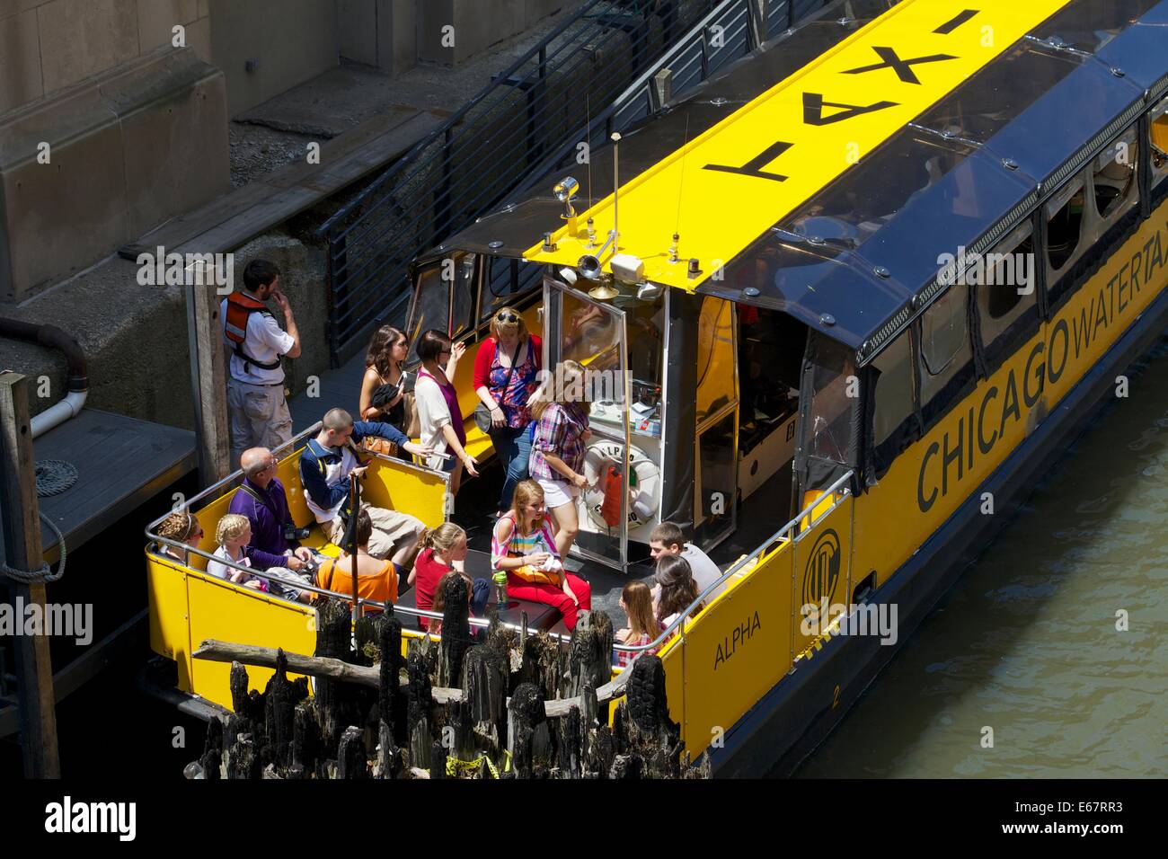 Passengers boarding water taxi. Chicago River. Stock Photo