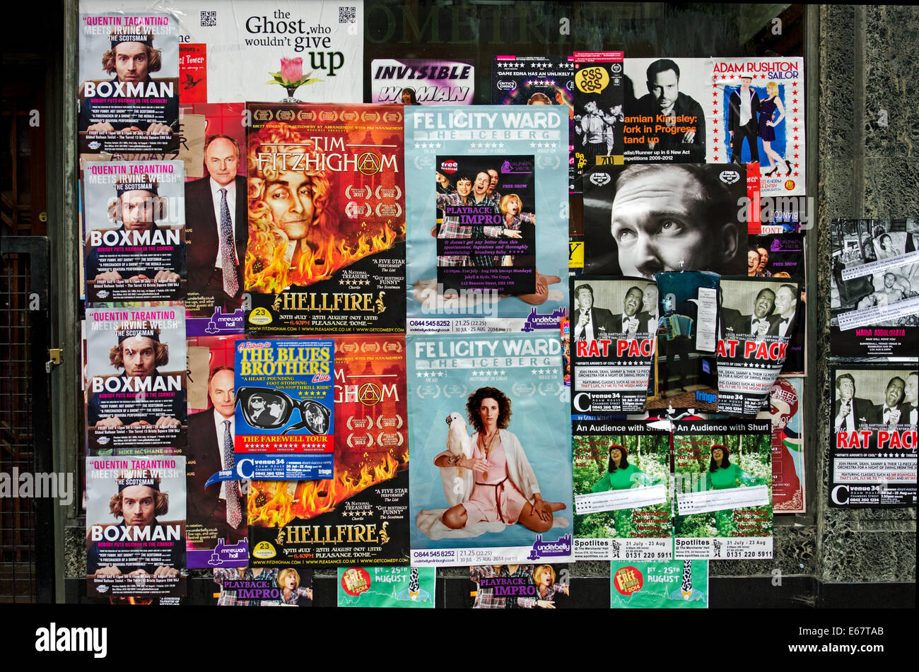 Edinburgh Festival Fringe posters on a vacant shop window Stock Photo
