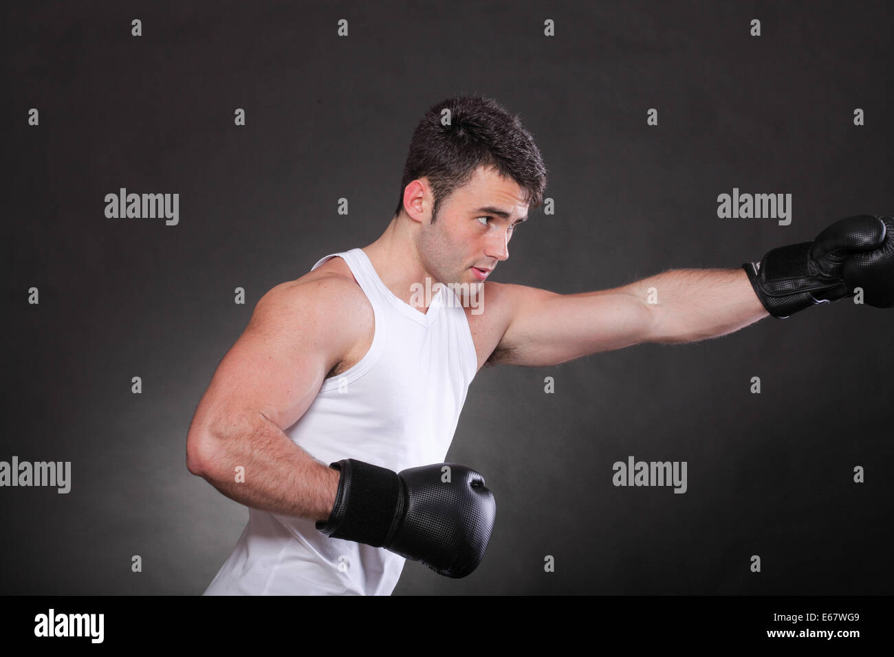 Boxer raising his arms strong athletic muscle man, sports guy showing