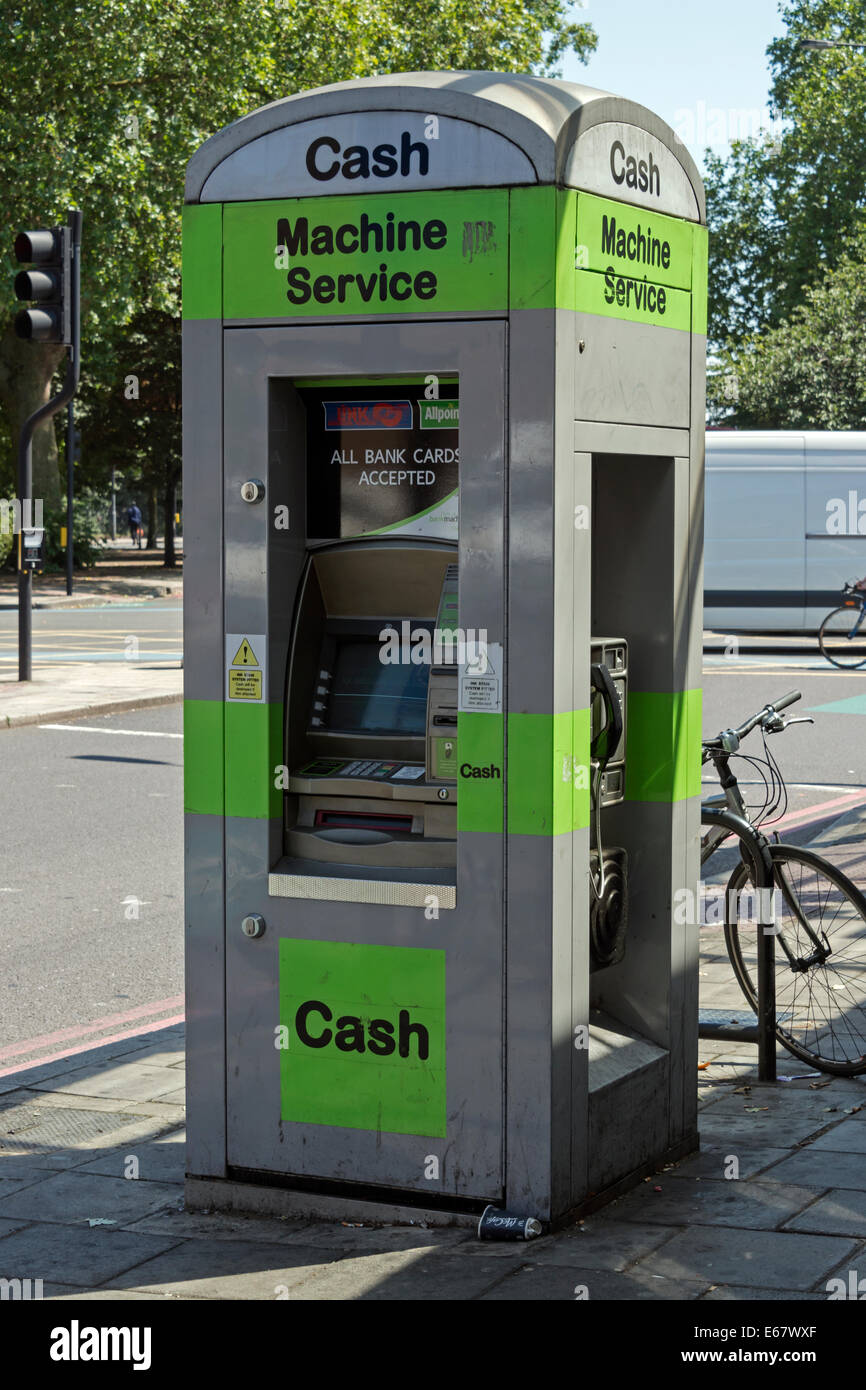 Cash Machine Dispenser Kiosk Outside Oval Underground Tube Station, London, UK Stock Photo