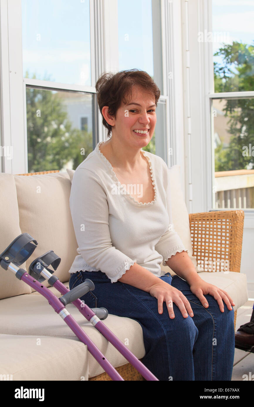 Woman with Cerebral Palsy and her crutches Stock Photo Alamy