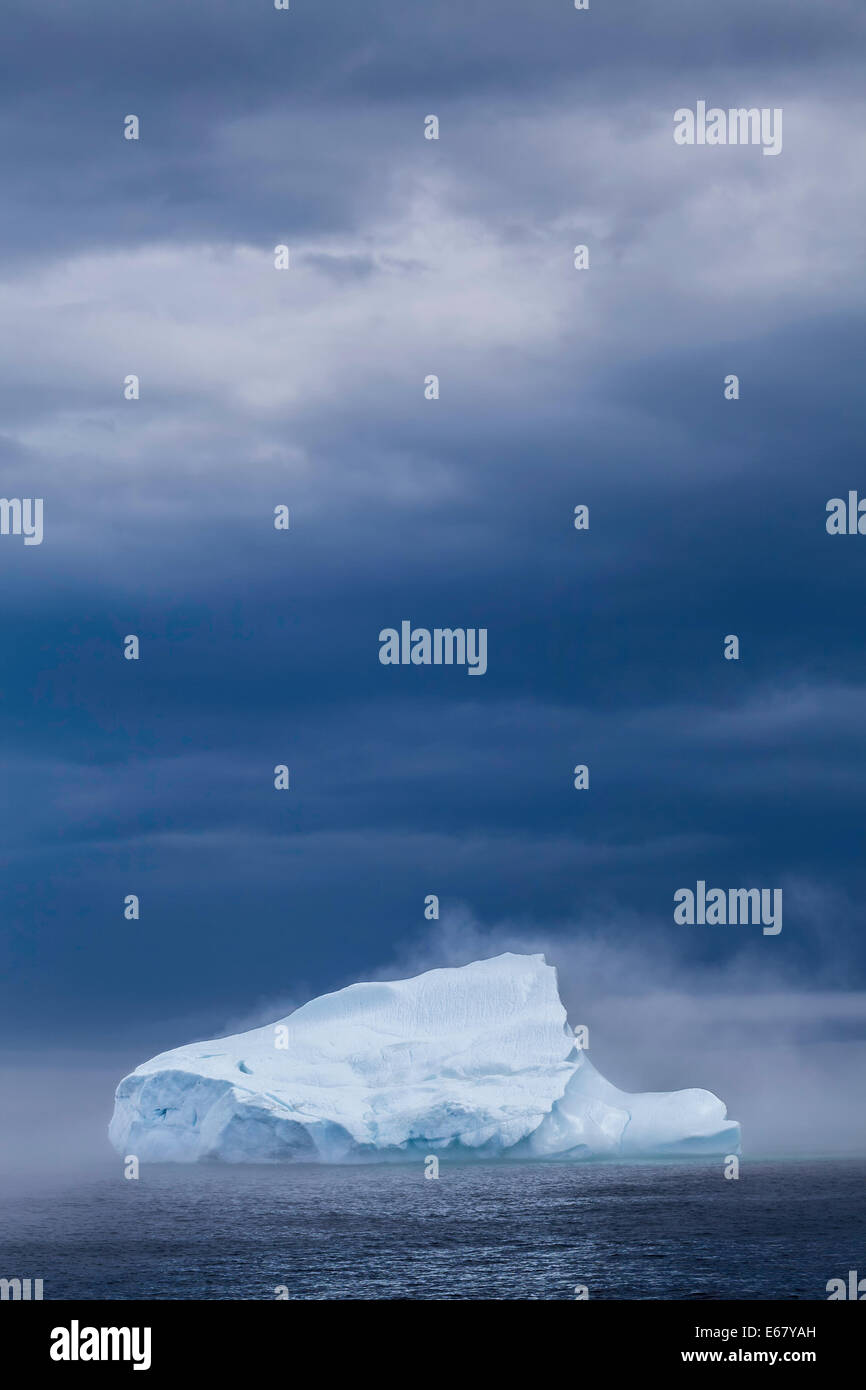 Storm over iceberg Stock Photo