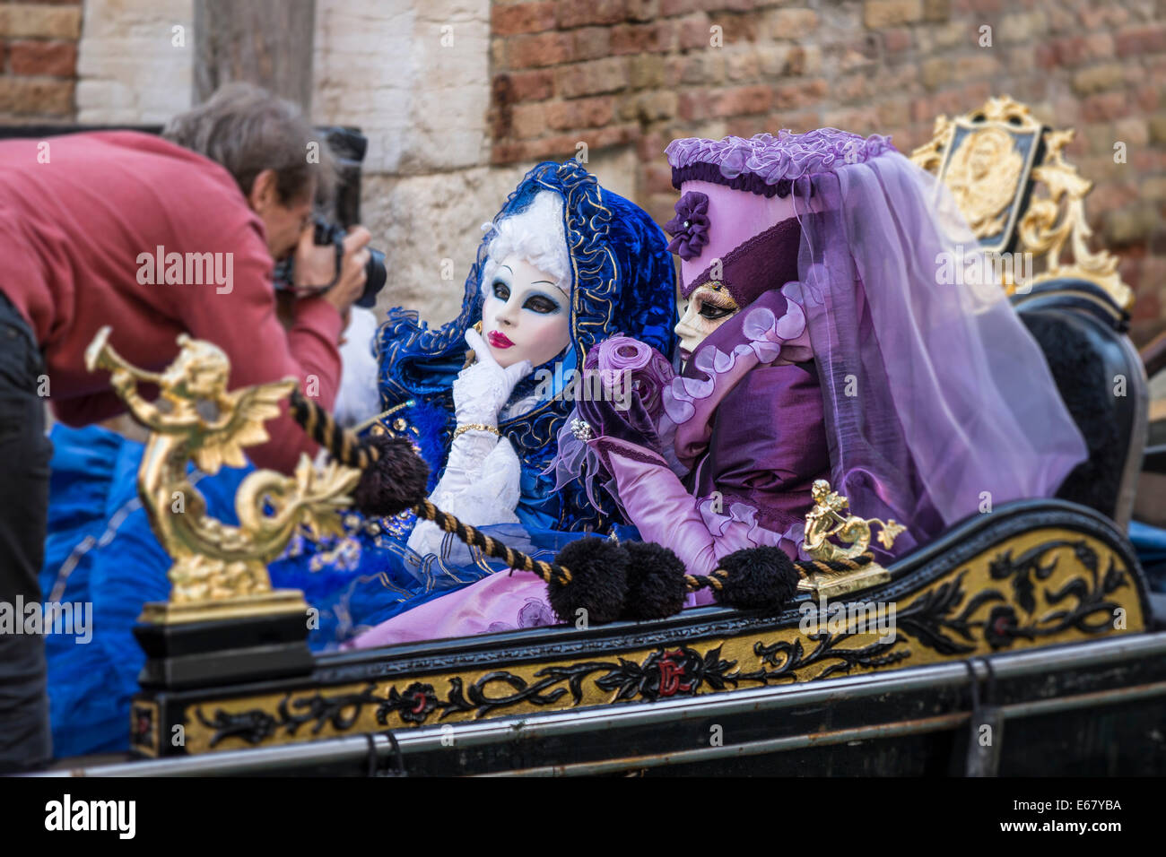 Purple costumes hi-res stock photography and images - Alamy