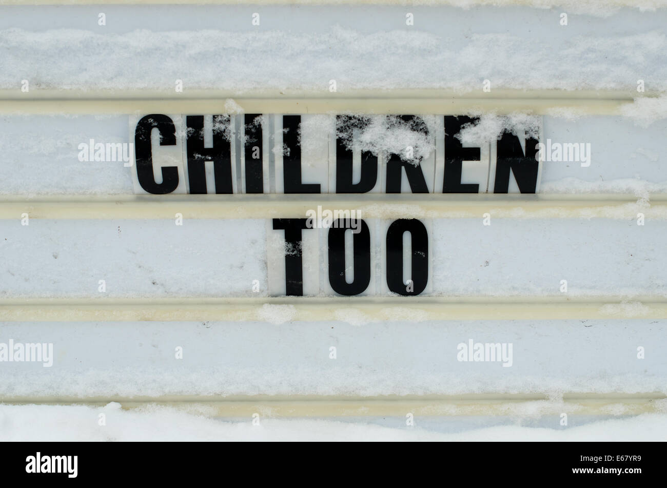 Outdoor, portable reader board with flexible plastic marquee sign letters saying 'Children too' Stock Photo