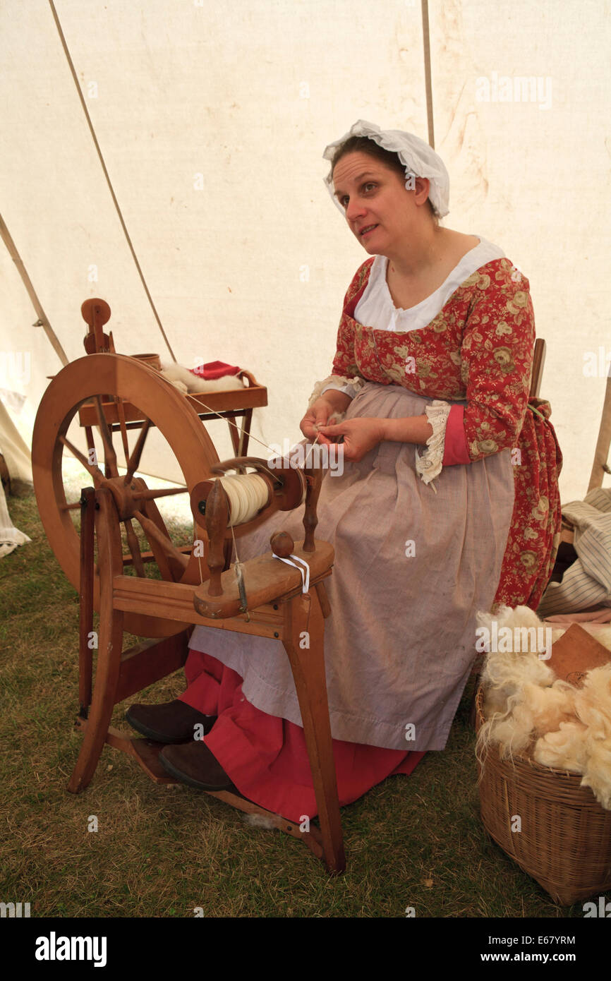 Woman spinning wool using traditional techniques Stock Photo Alamy