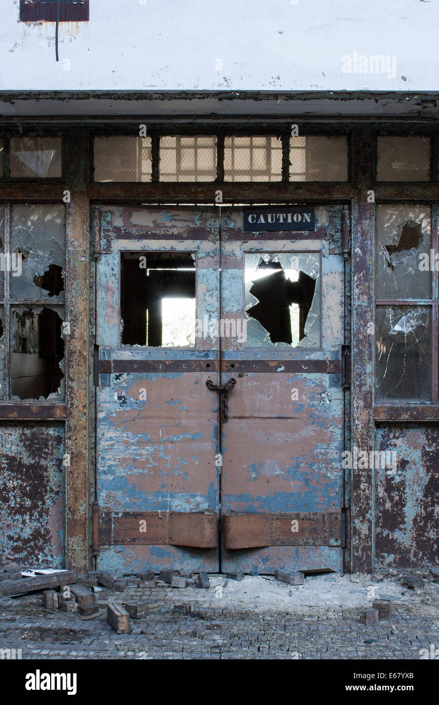 Locked door in abandoned building Stock Photo Alamy