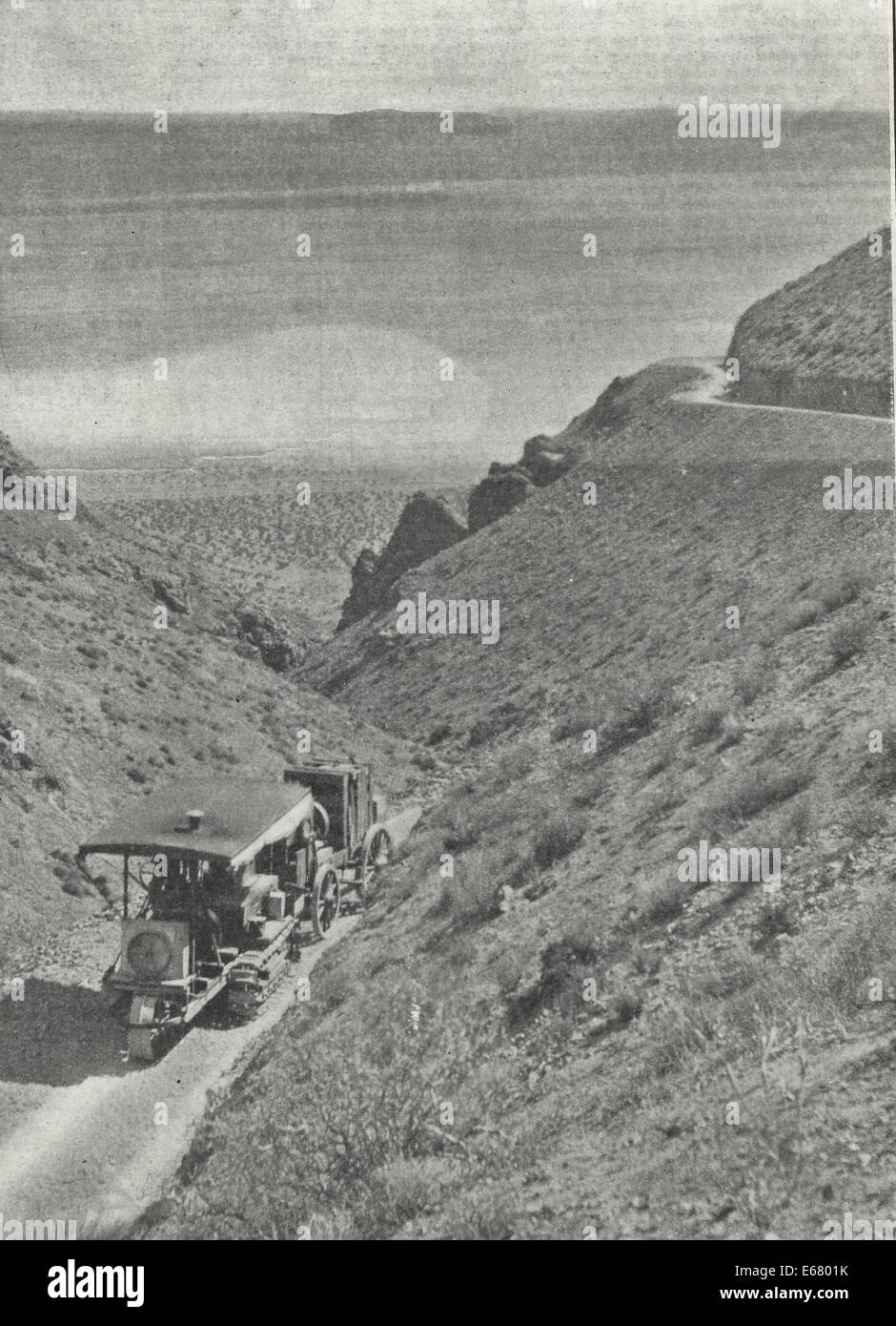 Gasoline Caterpillar Traction Engine Hauling Electrical Machinery Near The Mojave Desert, circa 1909 Stock Photo