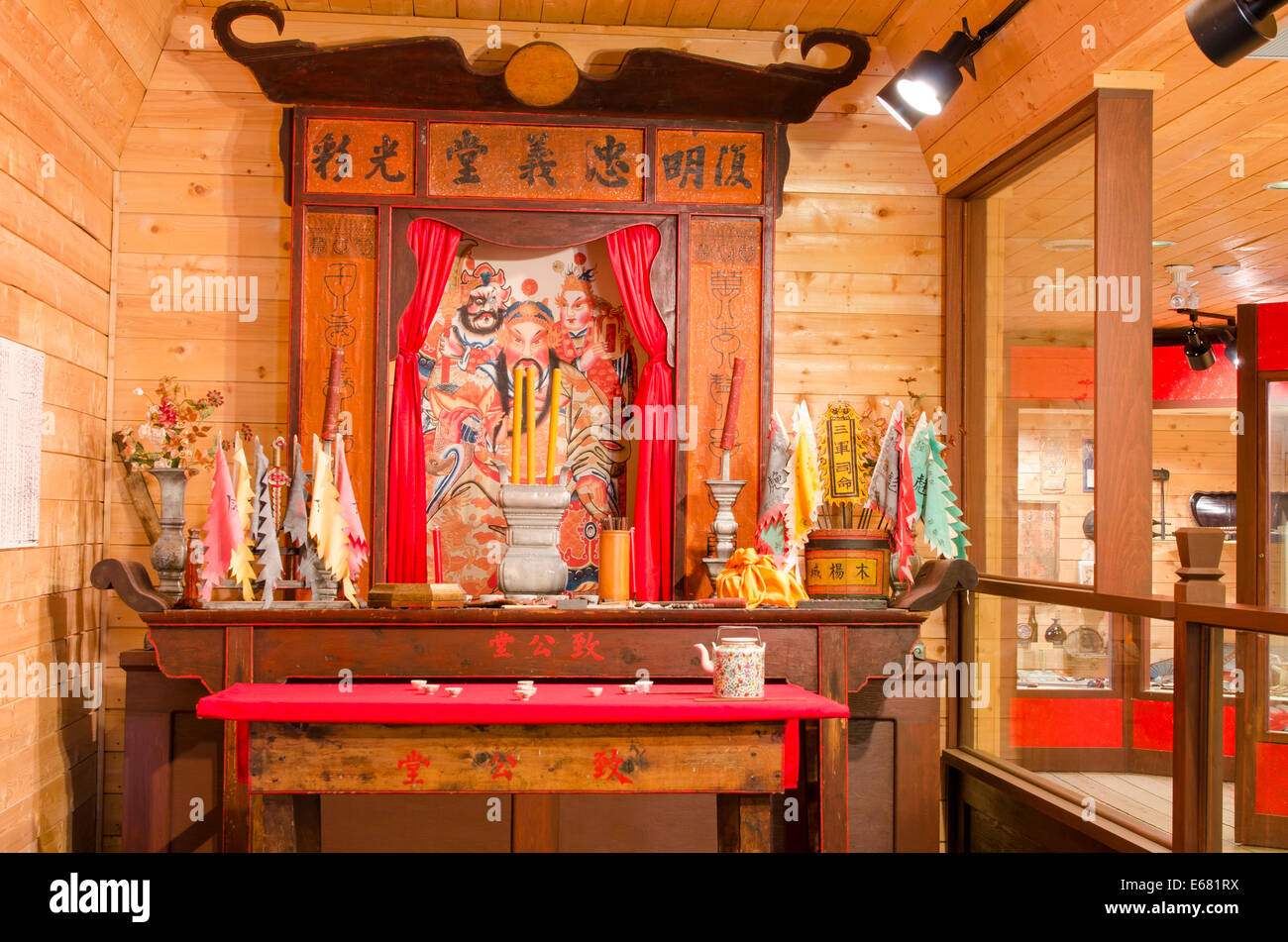 Altar shrine Chee Kung Tong Chinese Freemasons temple museum building historic gold town Barkerville, British Columbia, Canada. Stock Photo