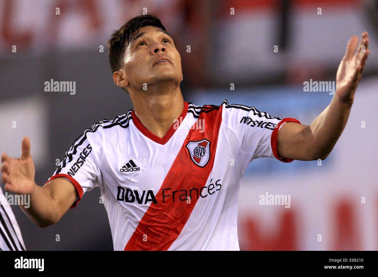 Buenos Aires, Argentina. 17th Aug, 2014. Teofilo Gutierrez of River Plate celebrates a goal during the match of week 2 of the First Division of Argentinean Soccer Tournament against Rosario Central, in the Antonio Vespucio Liberti Stadium, in the city of Buenos Aires, capital of Argentina, on Aug. 17, 2014. Credit:  Martin Zabala/Xinhua/Alamy Live News Stock Photo