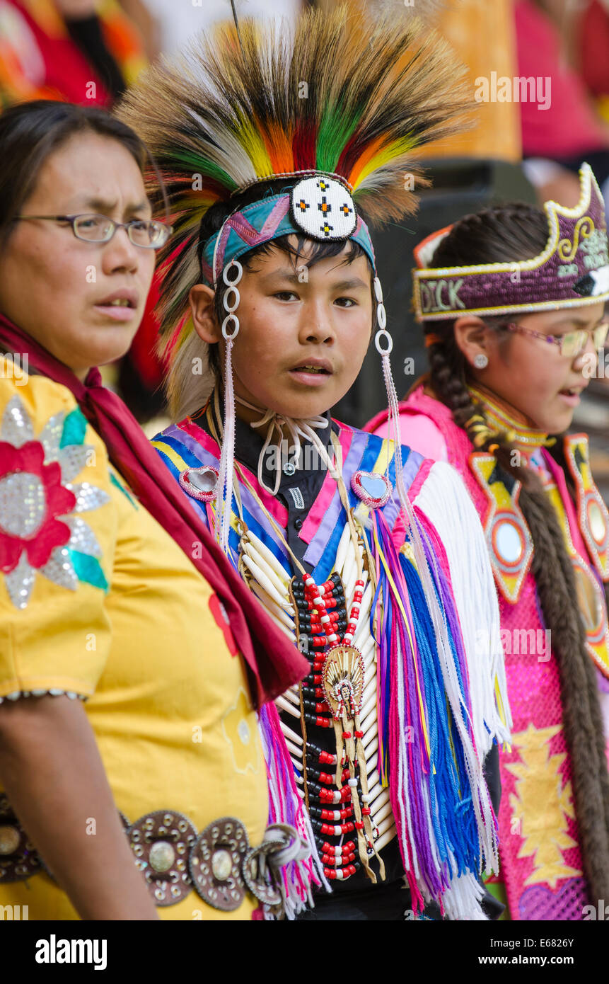 Traditional costumed Native First Nation family powwow pow pow dancer performer in Canim Lake, British Columbia, Canada. Stock Photo