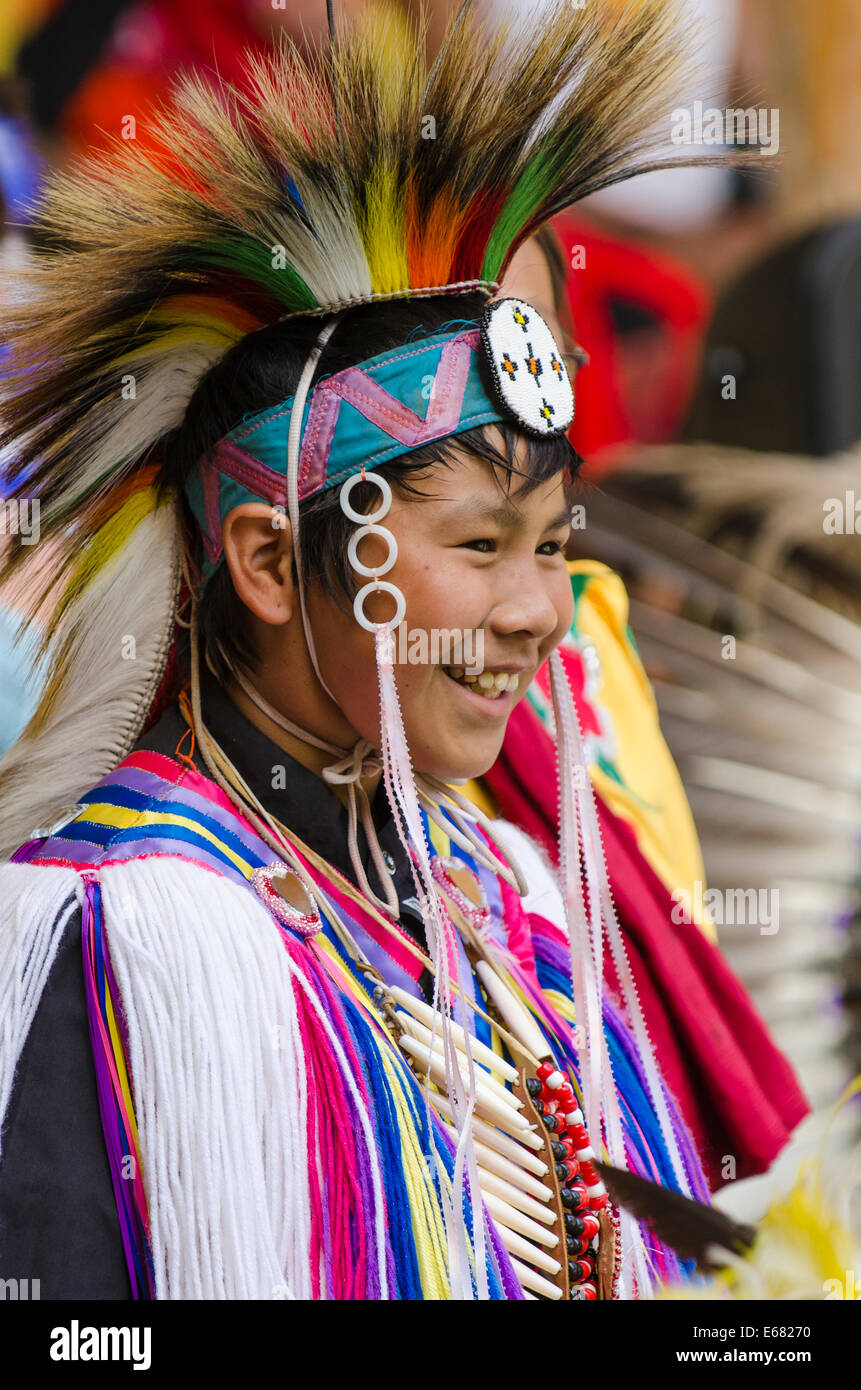 Traditional costumed Native First Nation boy powwow pow pow dancer performer in Canim Lake, British Columbia, Canada. Stock Photo