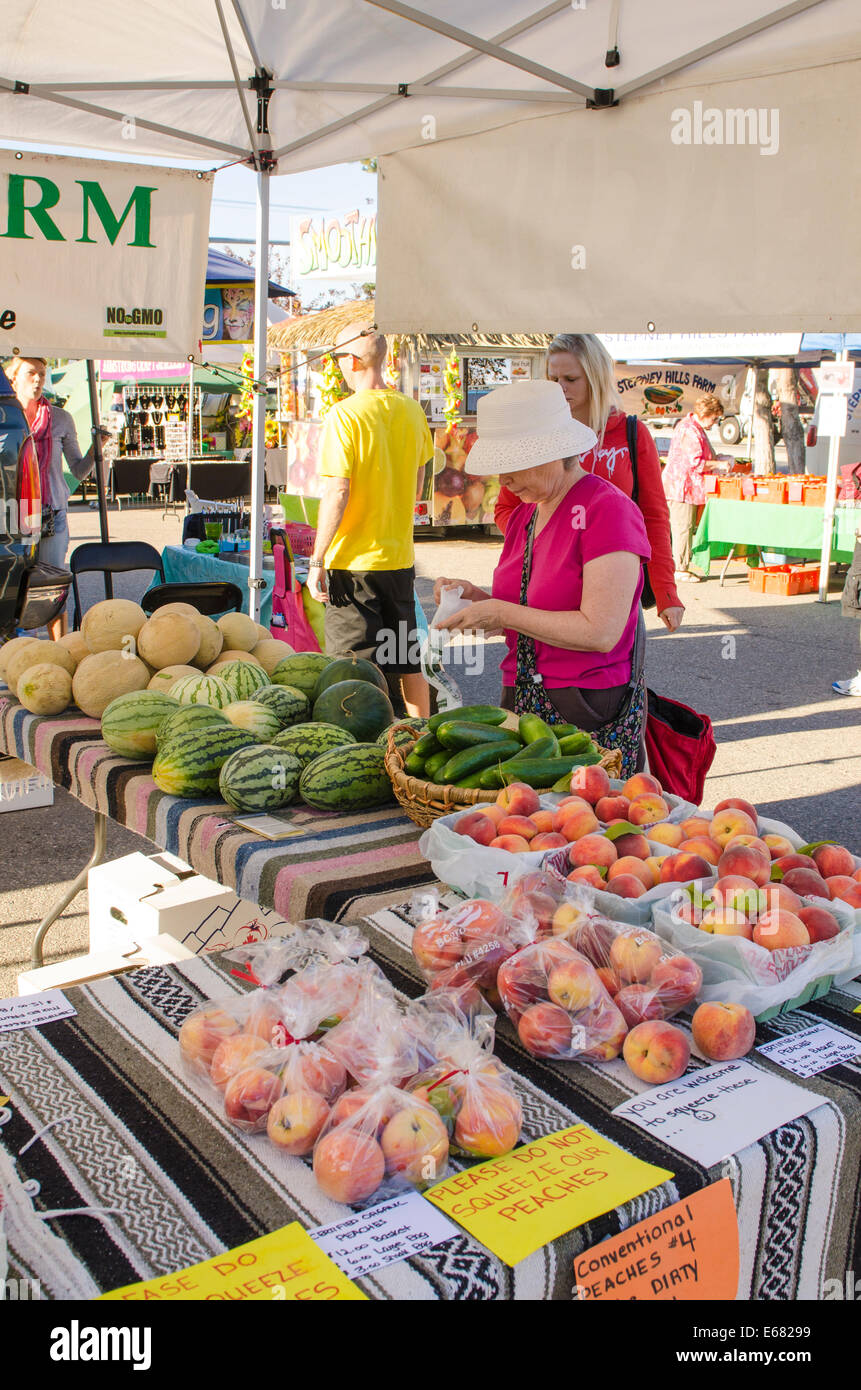 People shopping at fruit stand at the farmers market Okanagan Valley