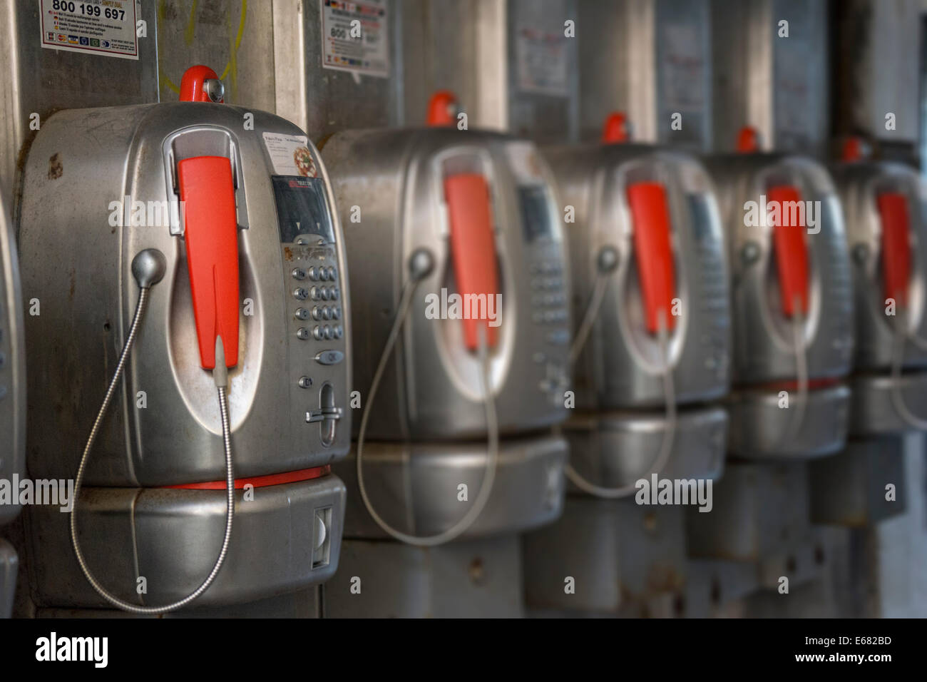 Line of old style pay phones located next to San Marco Square in Venice. Left to right orientation. Stock Photo