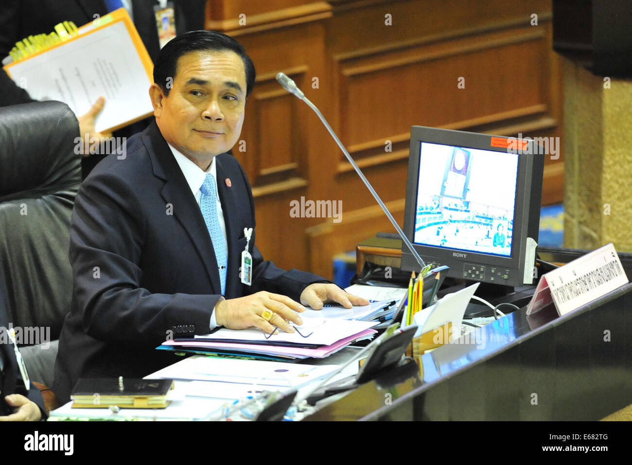 Bangkok, Thailand. 18th Aug, 2014. Thai Army Chief Gen. Prayuth Chan-ocha attends the meeting to propose the 2015 budget in Bangkok, Thailand, Aug. 18, 2014. He proposed the bill at the first meeting of National Legislative Assembly held at the Parliament House on Monday. © Rachen Sageamsak/Xinhua/Alamy Live News Stock Photo