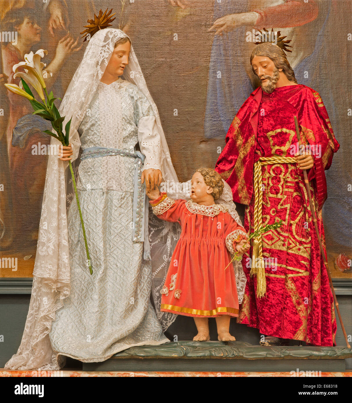 BRUSSELS, BELGIUM - JUNE 16, 2014: The Holy family in the dress in church Eglise de St Jean et St Etienne aux Minimes. Stock Photo