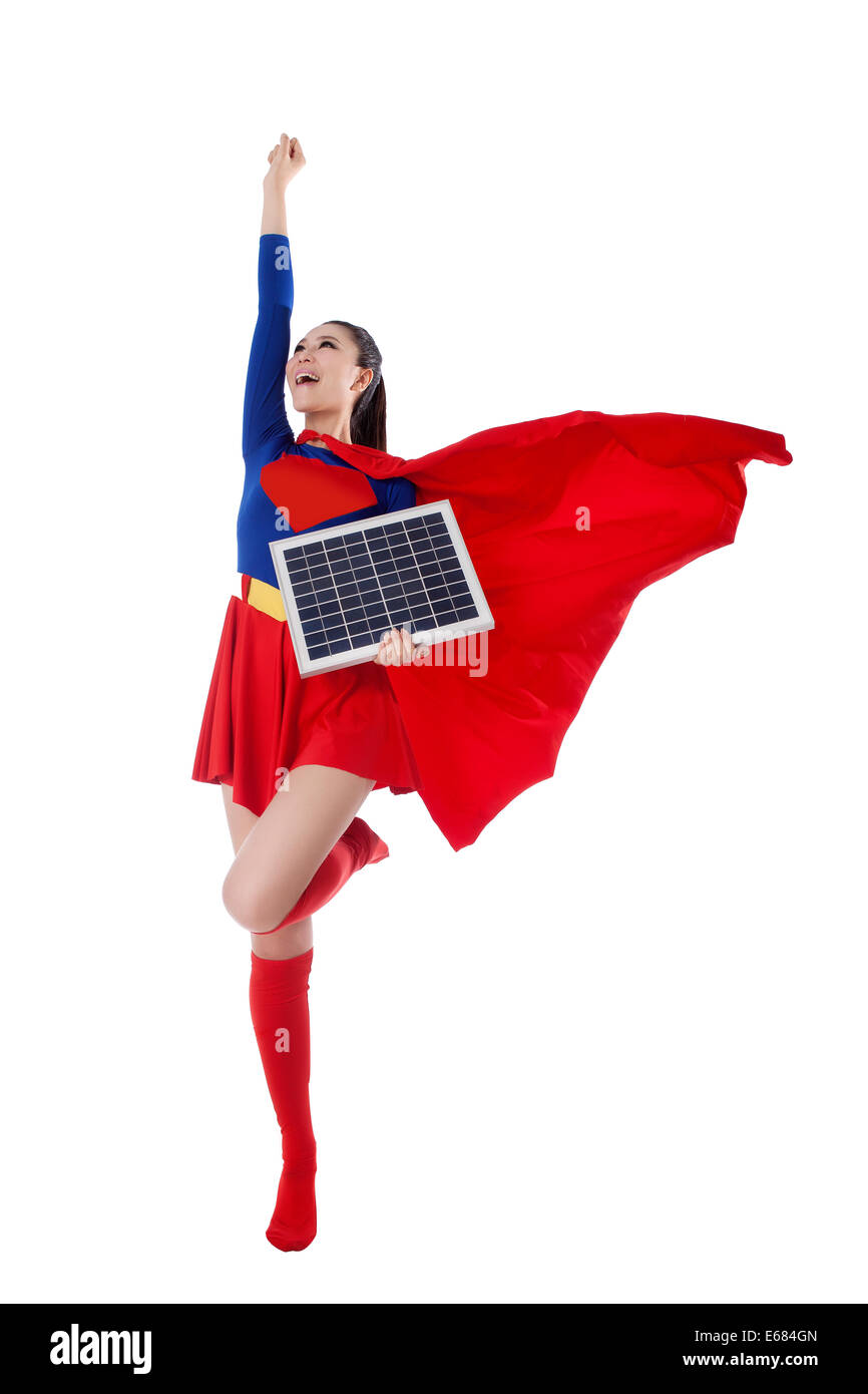 Young woman in superman outfit Stock Photo