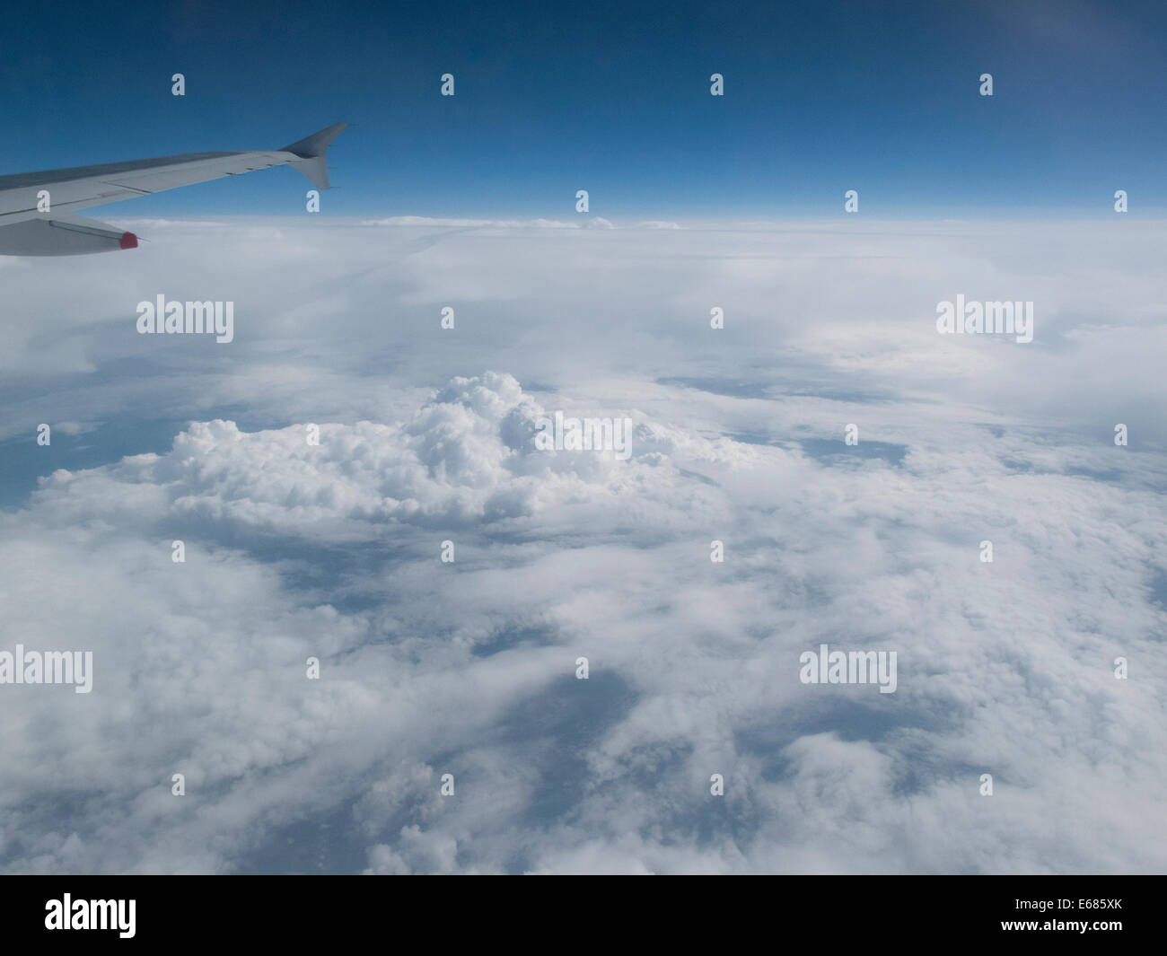 Thick clouds seen from high flying airliner over northern Europe Stock Photo