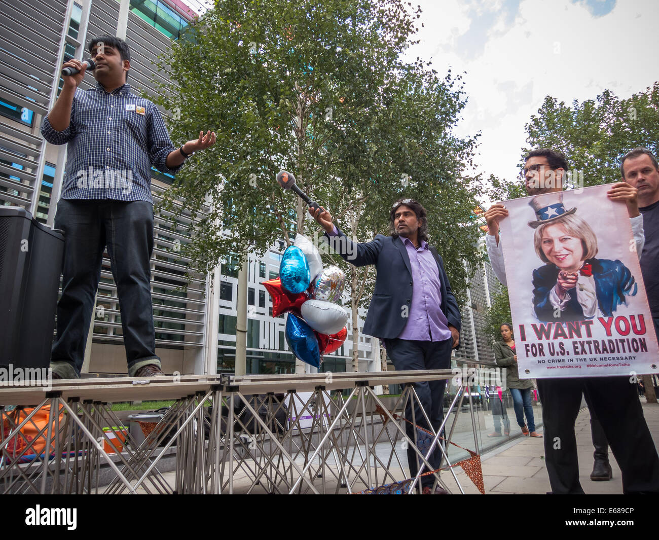London, UK. 17th Aug, 2014.  Talha Ahsan release party and speeches outside Home Office 2014 Credit:  Guy Corbishley/Alamy Live News Stock Photo