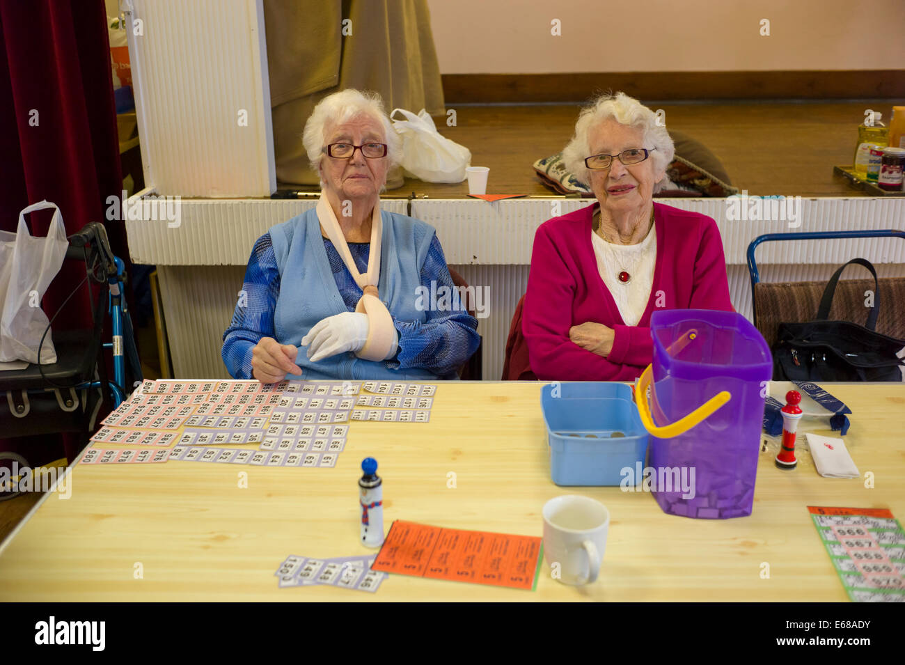 Two elderly women playing bingo Stock Photo