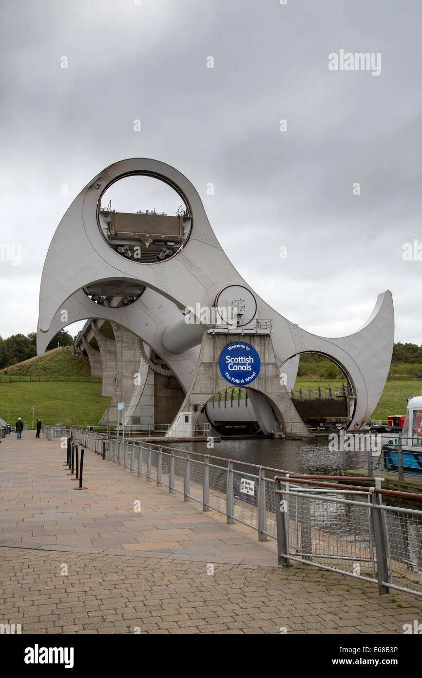 The Falkirk Wheel is a rotating boat lift connecting the Forth and Clyde Canal with the Union Canal, Scotland Stock Photo