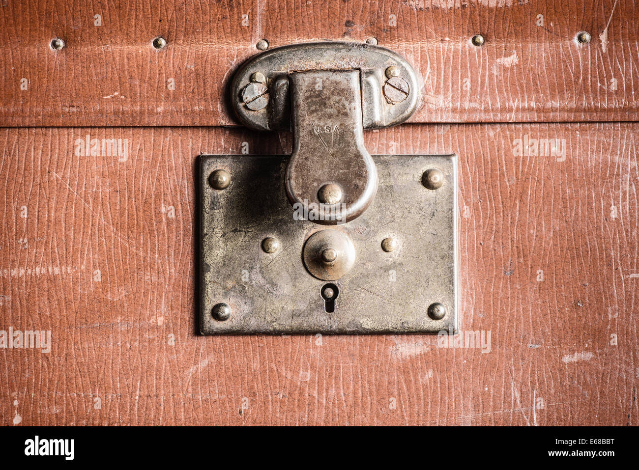 Close up of old brown leather bag. Detail of lock. Stock Photo