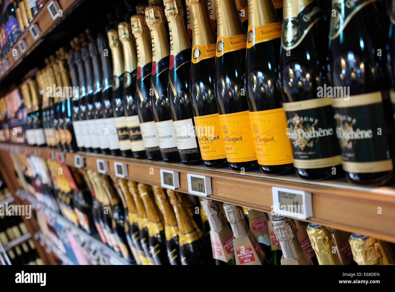 bottles of champagne in french supermarket Stock Photo