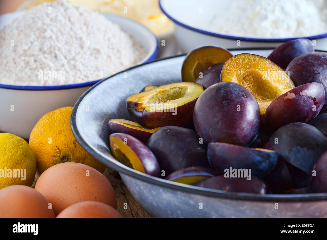 Close up of various ingredients for a plum cake Stock Photo - Alamy