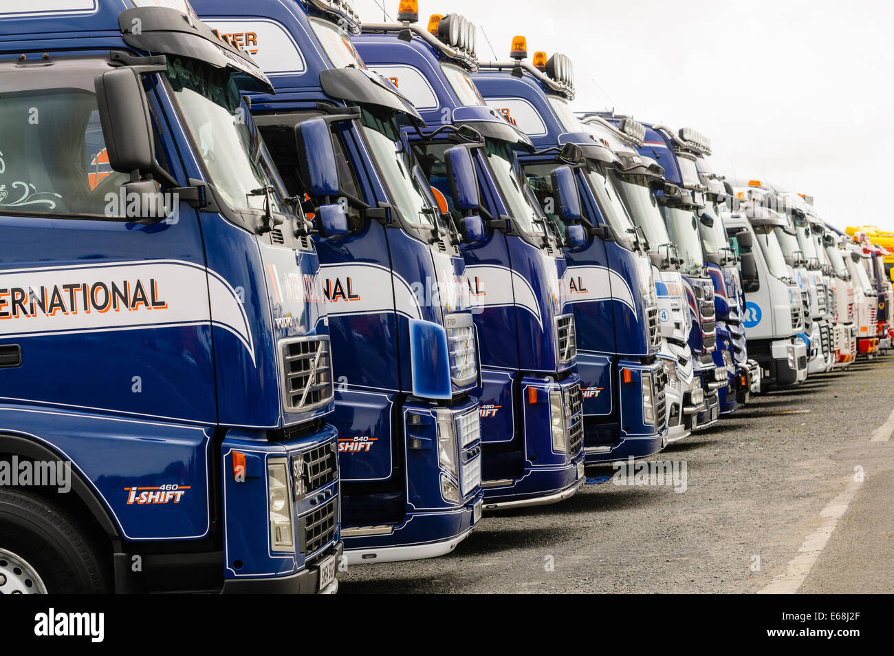 Row of lorries parked up Stock Photo