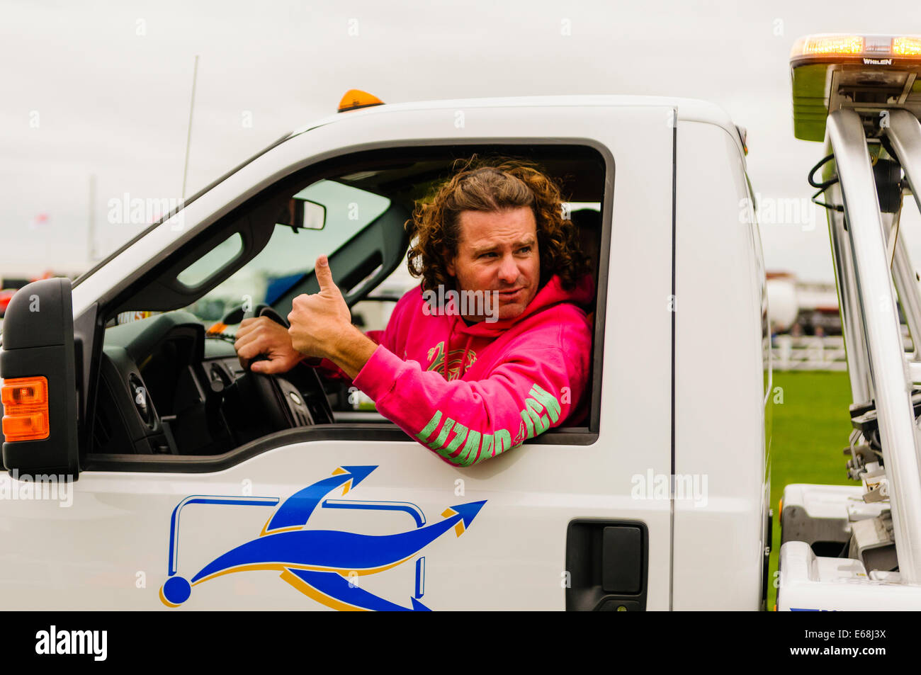 Johnny from Lizard Lick Towing gives a thumbs up Stock Photo Alamy