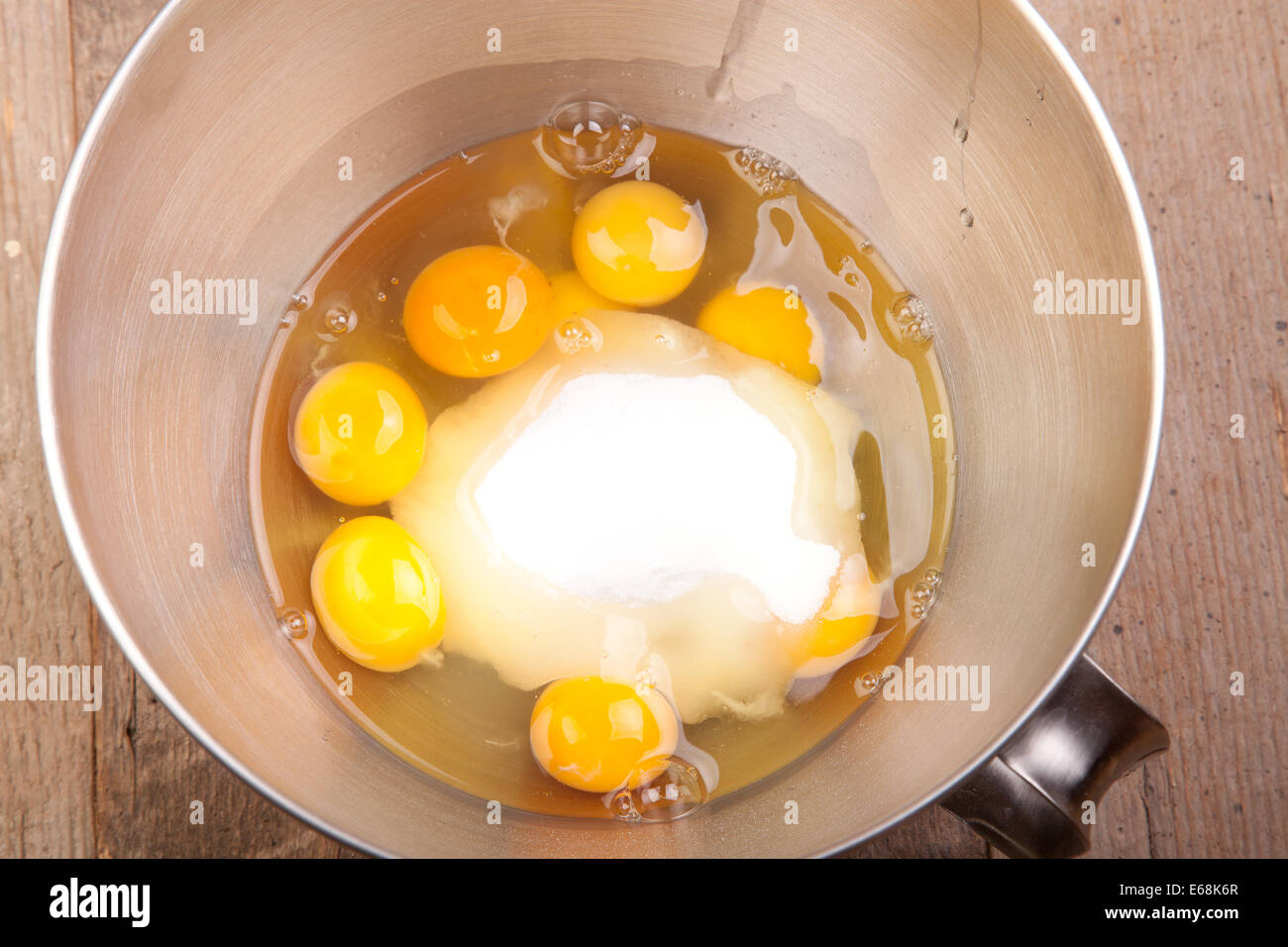 eight eggs with sugar in the glass bowl Stock Photo Alamy