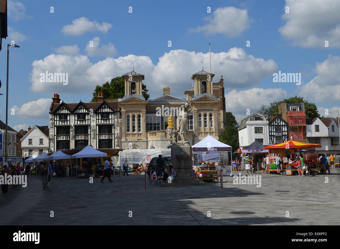 RoyalBorough KingstononThames marketplace with its ancient buildings and street marketeers gets ready for aday of selling&buying Stock Photo