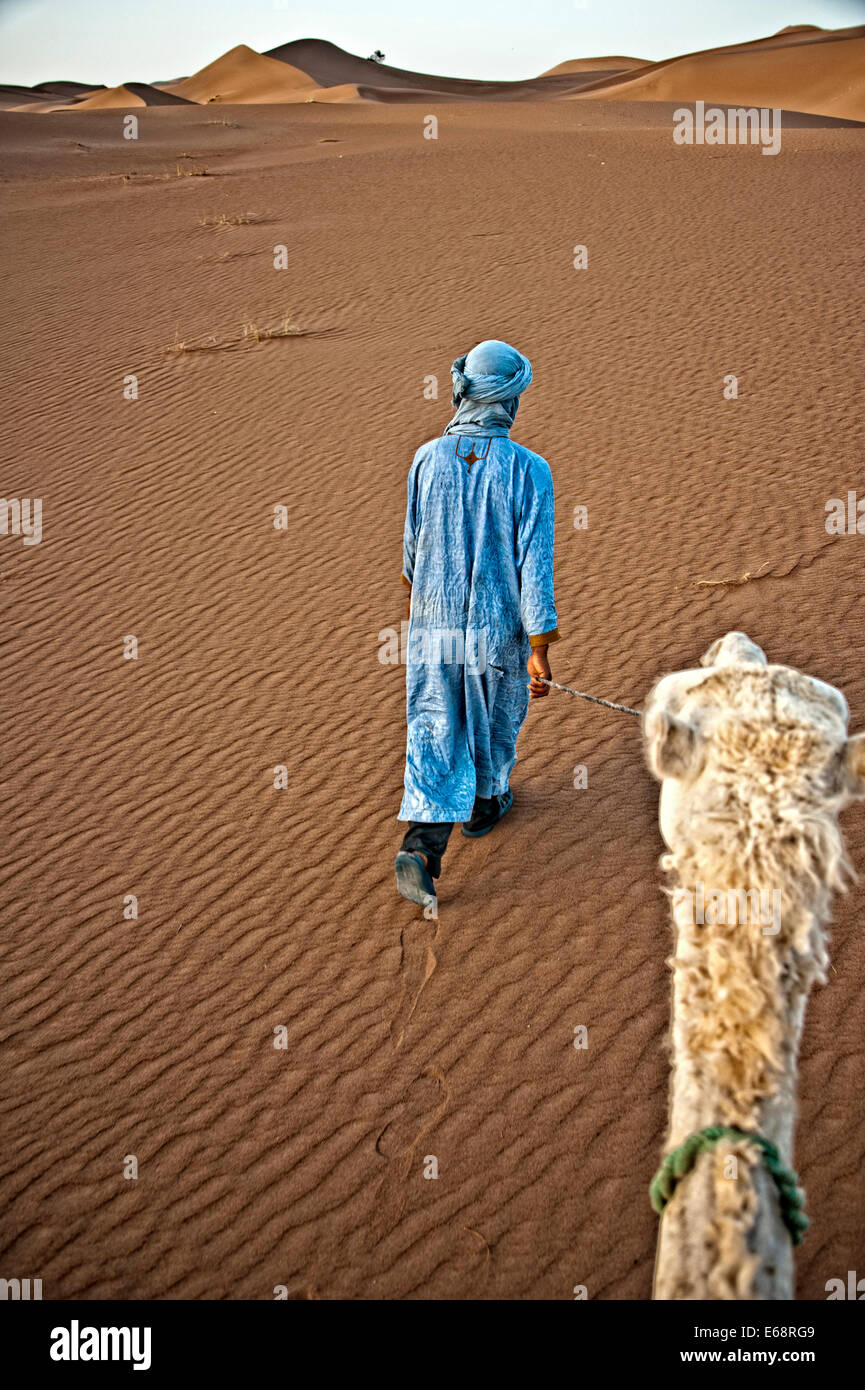 Nomad with camel, Sahara Desert Stock Photo