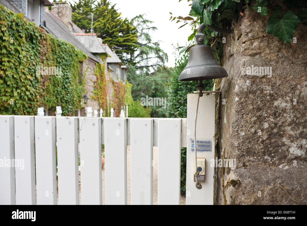 Old style house bell outside French residence, La Trinité-sue-Mer, Brittany, France Stock Photo