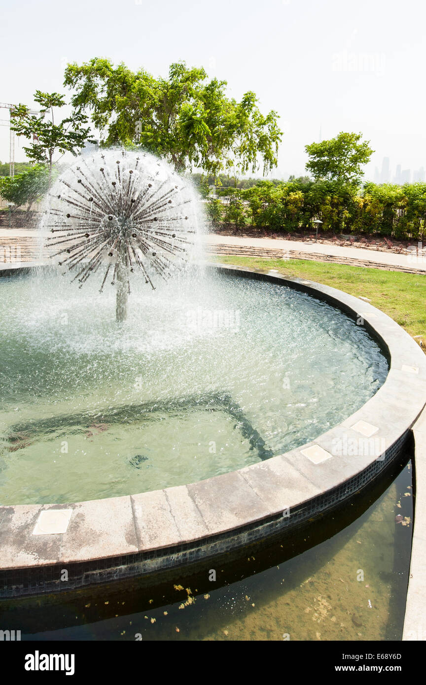 Water fountain in gardens garden of Raffles Dubai Hotel Dubai, United Arab Emirates UAE. Stock Photo