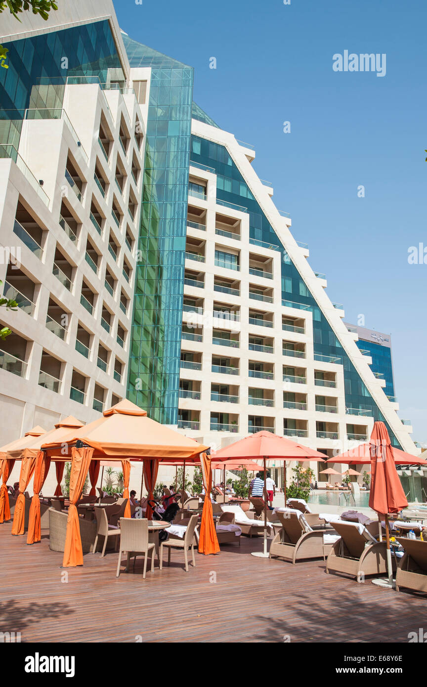 Pool deck area at the Raffles Dubai Hotel Dubai, United Arab Emirates UAE. Stock Photo