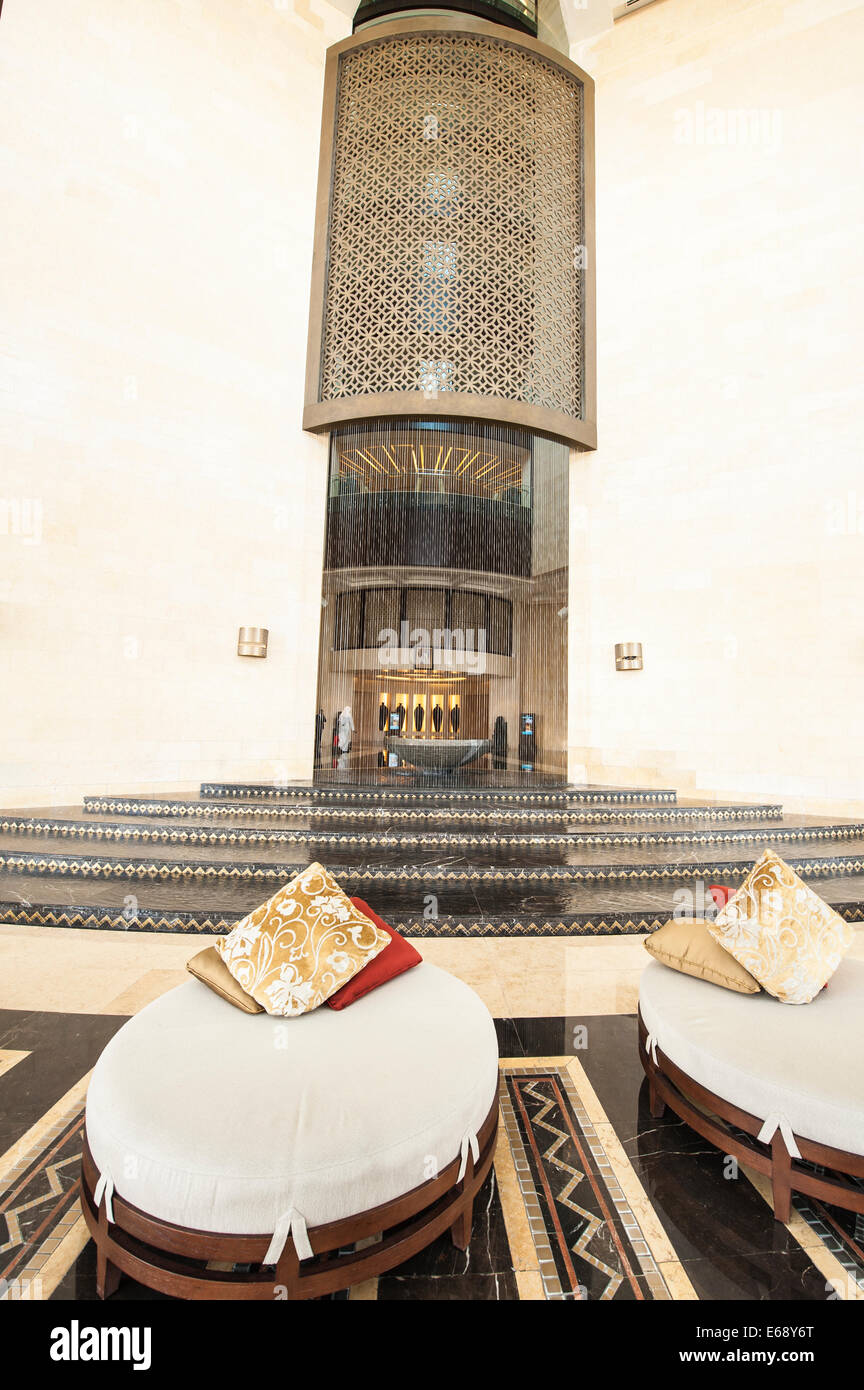 Entrance lobby lounge seats of the Raffles Dubai Hotel, Dubai, United Arab Emirates UAE. Stock Photo