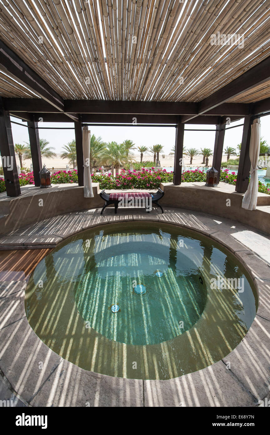 Pool hot tub jacuzzi deck patio area at the Bab Al Shams Desert Resort & Spa. Dubai, United Arab Emirates UAE. Stock Photo