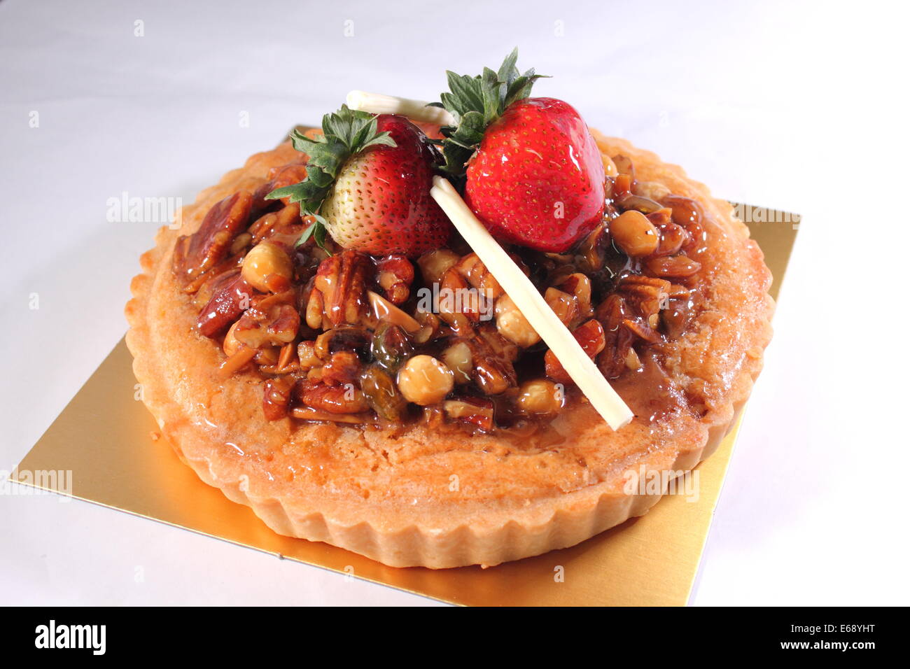 A Mixed nuts pie decorated with strawberry Stock Photo Alamy