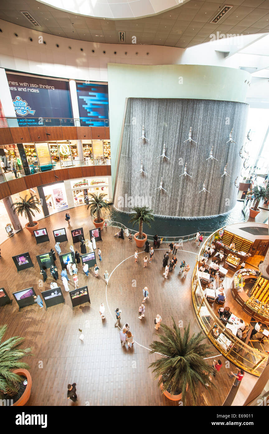 Divers sculpture fountain multi floor retail stores shops The Dubai