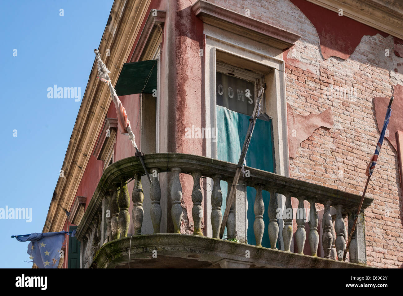 Corner balcony of old guest house in Venice. Stock Photo
